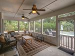 Screened Porch off Kitchen Overlooks Pool at 46 Lagoon Road in Forest Beach